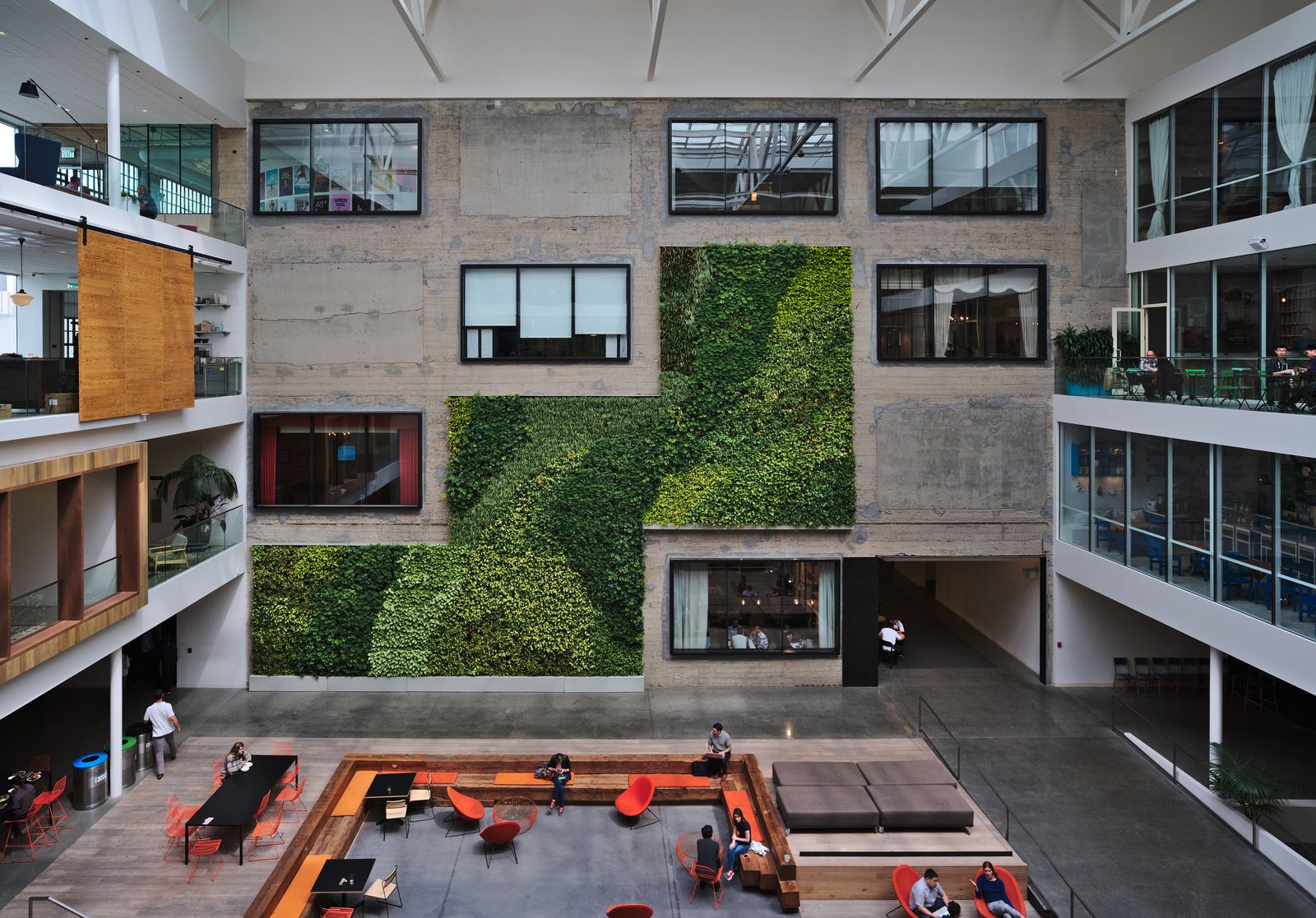 Bright multi-level atrium inside Airbnb's headquarters at 888 Brannan Street in San Francisco