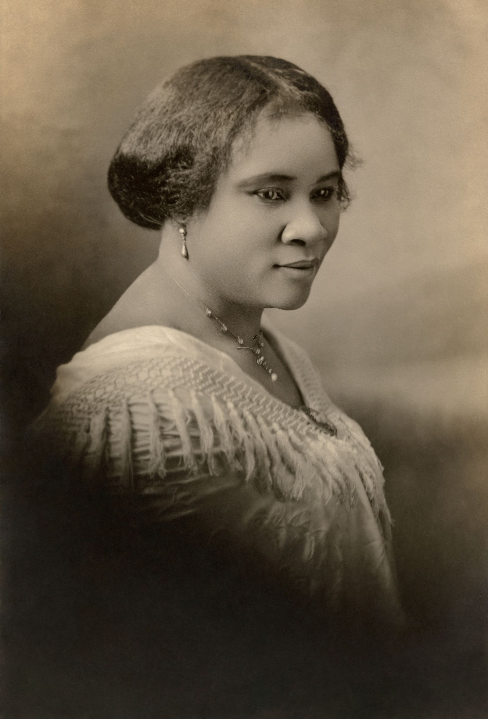 Studio portrait of entrepreneur Madam C. J. Walker by photographer Addison Scurlock